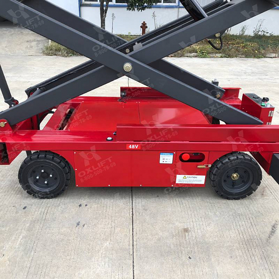 OXLIFT QZ-050-090 Самоходный (поводковый) подъемник ножничного типа с питанием от АКБ 9000 мм 500 кг
